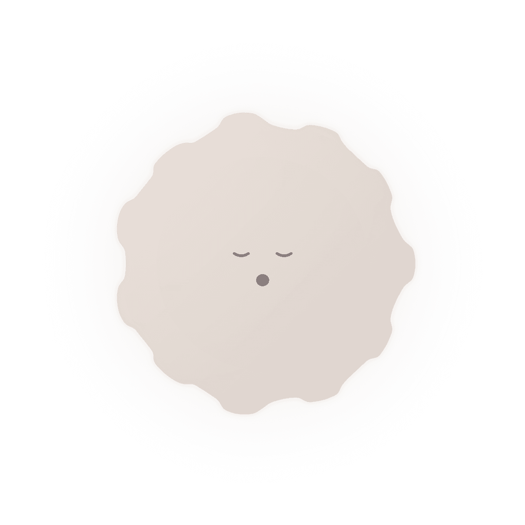 oléyoga's character mid-breath, eyes closed, lips pursed on a slow exhale